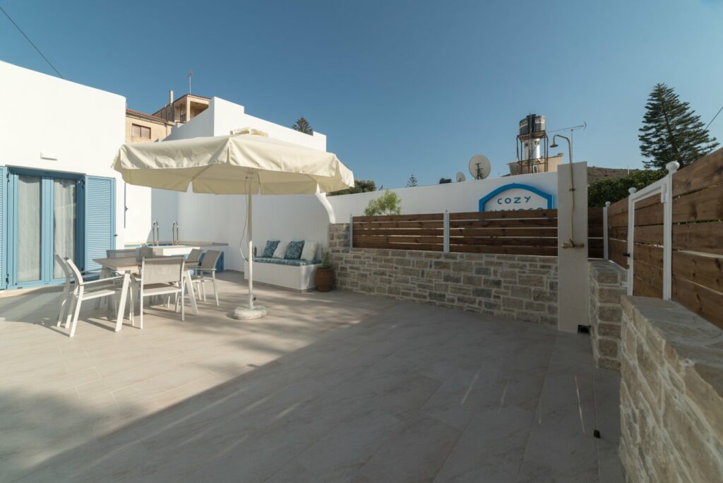 The side of the yard, with the outside shower