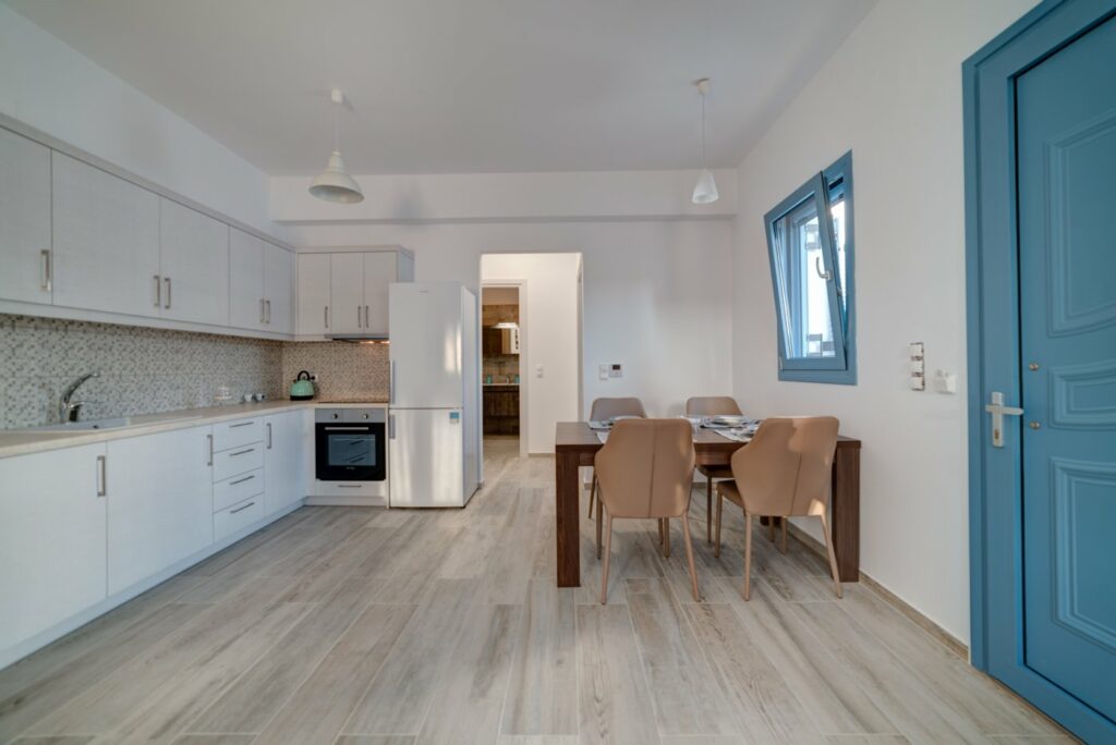 The kitchen facing towards the bedroom and the toilet